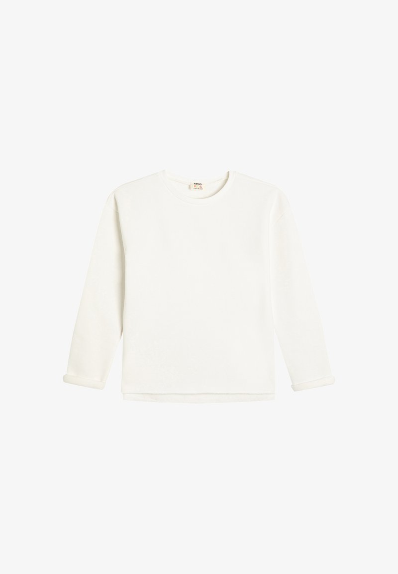 Sudadera blanca de manga larga hecha de una tela suave, con escote redondo y puños enrollados, y un dobladillo inferior recto.