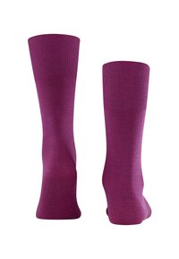 Medias altas moradas con un diseño acanalado en la parte superior y un cuerpo liso, de color uniforme, con una forma ajustada en la punta y el talón.