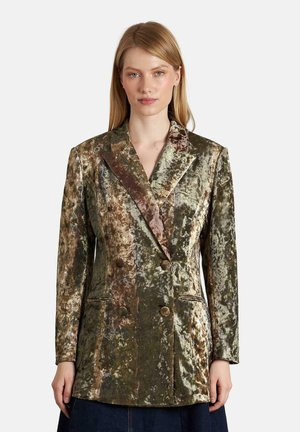 Blazer de doble botonadura en terciopelo multicolor, con un collar satinado, variaciones de textura y dos bolsillos frontales con botones redondos.