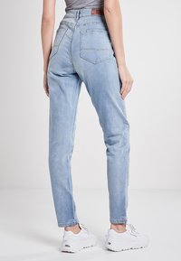 Urban Classics LADIES HIGH WAIST SLIM JEANS - Vaqueros slim fit - authentic blue wash