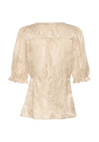 Top beige chiaro con tessuto testurizzato. Presenta maniche a sbuffo, un collo rotondo e un orlo svasato con accentuazioni arricciate.