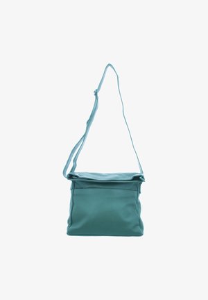 Teal leather shoulder bag with a flap closure, adjustable strap, and front pocket. Soft texture and smooth finish with minimal design.