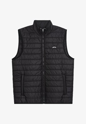 Mustat pehmeät liivit, joissa on korkea kaulus, täysi vetoketju, tikattu kuvio ja kaksi sivutaskua. Brändin "UNFAIR" logo edessä.