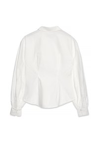 Witte katoen blouse met een klassiek kraag, lange pofmouwen en een nauwsluitende pasvorm met geraffineerde details aan de achterkant. Met knoopsluiting bij de mouwen.