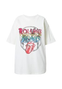 Hvid oversized t-shirt med et farverigt Rolling Stones grafik med en rød tunge og legende tekst, fremstillet af blødt bomuldsstof.