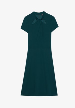 Teal dress with short sleeves, featuring a tie neck detail and cutouts at the shoulders. Smooth fabric, A-line silhouette. Zipper closure at the back.