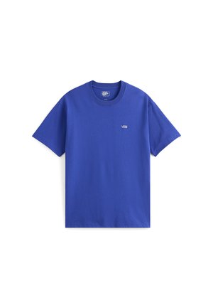 T-shirt in cotone blu reale con maniche corte, collo a girocollo e piccolo logo Vans bianco sul petto a sinistra. Tessuto liscio, vestibilità standard.