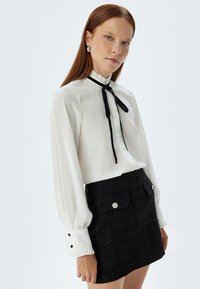 Koton RUFFLE HIGH NECK - Button-down blouse - off white