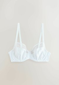 Fehér alátámasztós melltartó állítható pántokkal és áttetsző hálós panelek a felső kosarak mentén, semleges háttérrel egy síkban elhelyezve.