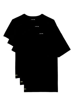 T-shirts em algodão pretos dispostos juntos, com mangas curtas, um decote redondo e um pequeno logo verde no canto inferior esquerdo.