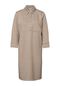 Beige overhemdjurk van textuurstof, met een knoopsluiting aan de voorkant, kraag, lange mouwen en een borstzak.