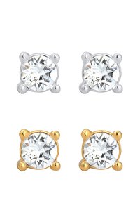 Silber- und Goldsteckerohrringe mit runden, klaren Edelsteinen. Jeder Ohrring hat vier Krappen, die die Steine sicher an ihrem Platz halten.