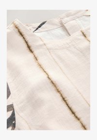 Unselected, cream neutral palm print