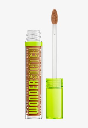 Tube des NYX professional makeup Wonderstick Concealers mit grünem Deckel und Applikatorstab, der das braune Cremeprodukt zeigt.
