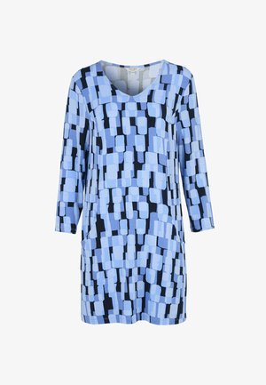 Langærmet tunika med V-udskæring, der har et geometrisk mønster af blå og sorte rektangulære former.