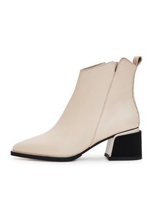 Overkneeskor - beige