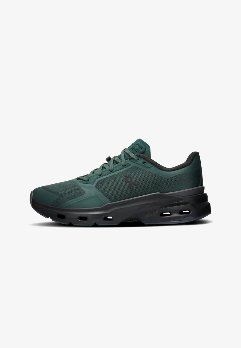Dark green athletic shoe with black sole, mesh upper, side logo, and lace-up closure shown from outer side on white background.