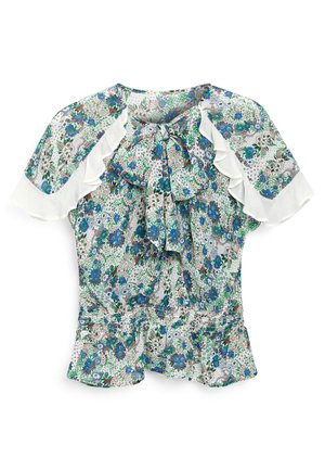 Blouse à imprimé floral avec manches blanches à volants, présentant des nuances de vert et de bleu, un ruban au niveau du col et une taille froncée.