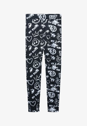 Leggings neri con una stampa grafica di doodle bianchi, tra cui corone, cuori e faccine sorridenti, su un tessuto liscio e elasticizzato.