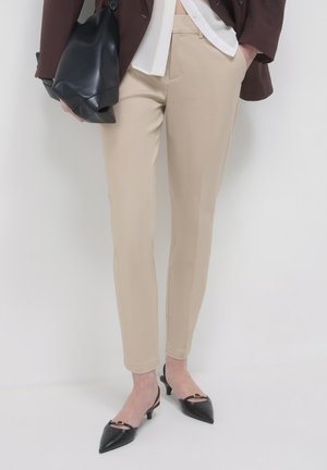 Chino - beige medio