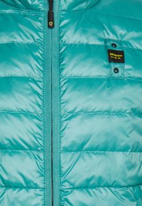 Blauer Casaco de penas - light blue