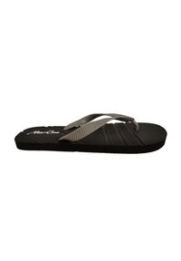 Black flip-flop with textured sole, rubber straps, and a textured accent band. Features brand name on top in white.