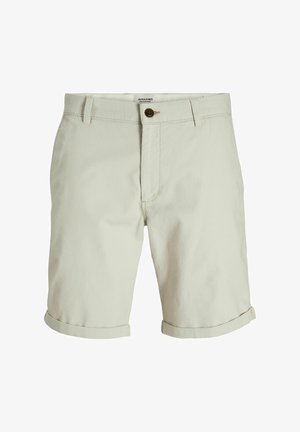 Beige cotton shorts with a textured finish, featuring a button closure, rolled cuffs, and side pockets.