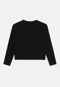 Black long-sleeve cropped top with a round neckline and soft texture. The fabric appears smooth, with no visible patterns or accents.