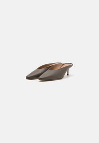 Dark gray leather mules with a pointed toe, open back, and a low heel, featuring a smooth texture and minimalist design.