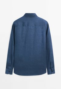 Dark blue long-sleeve shirt, made of textured fabric, featuring a classic collar and buttoned cuffs. Back view shows a smooth finish.