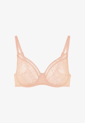 Soutien-gorge en dentelle avec armatures de couleur pêche douce, panneaux transparents, motif floral et design à bord festonné. Offre un soutien structuré.