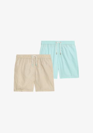 Deux maillots de bain : un en bleu ciel uni, l'autre beige avec des rayures verticales. Les deux présentent des ceintures élastiques et des cordons de serrage.