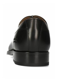 Zwarte leren dresschoenen met een gladde afwerking, ronde neus en een lage, gestapelde hak. Kenmerkt zich door een minimalistisch ontwerp en subtiele stiksels.