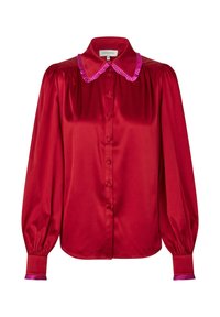 Red satin blouse featuring a pink ruffled collar and cuffs, buttoned front, and long puffed sleeves. Smooth texture with a glossy finish.