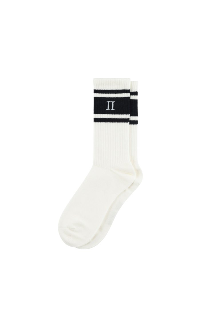 White athletic socks with a ribbed texture, featuring black stripes and a centered "II" in black. Designed for comfort and style.