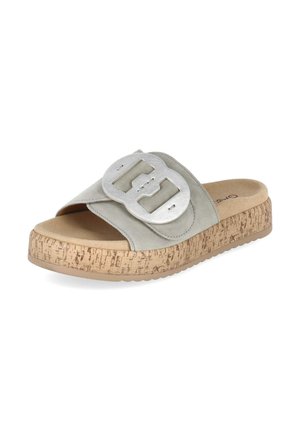Light gray slip-on sandal with wide strap, large decorative silver buckle, cushioned cork sole, and open toe design.