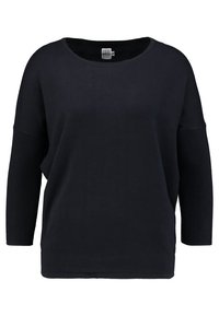 Lös svart tröja med bred halsringning, ribbade långärmar och mjuk textur. En enkel, mångsidig design som  är lämplig för att bära i lager.