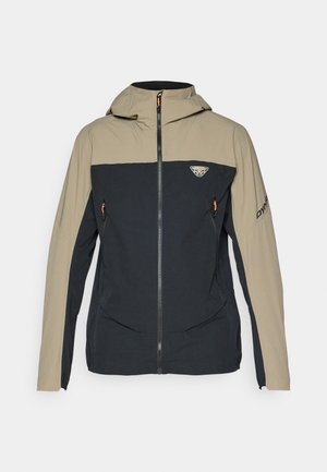 Herrenjacke mit schwarzem Oberteil und khakifarbenen Ärmeln, aus leichtem Material gefertigt, mit einem Frontreißverschluss und zwei Seitentaschen.