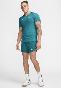 Nike Performance RAFA - Sportska majica - geode teal volt