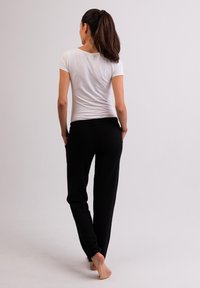 CASH-MERE Tygbyxor - black