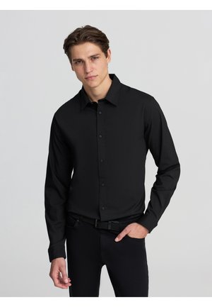 STRETCH - Camicia - nero