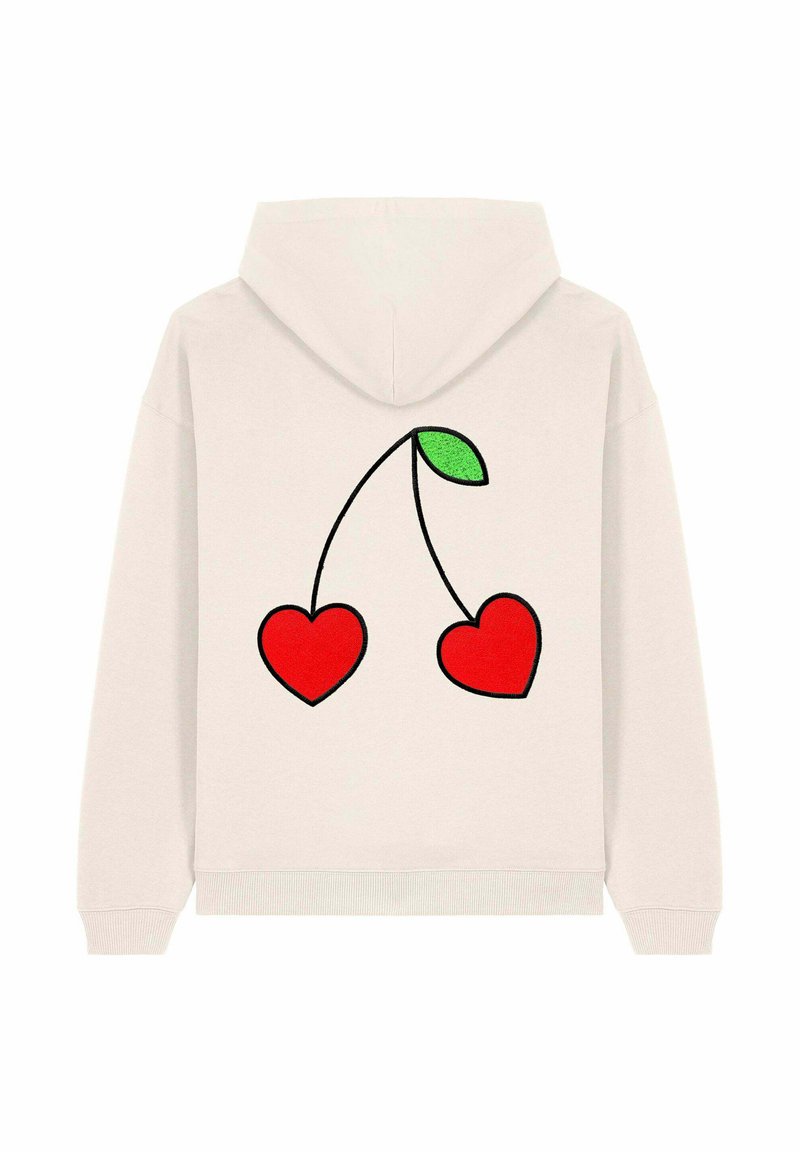 Sudadera beige clara con un gráfico en la parte posterior de dos corazones rojos conectados por una línea negra con una hoja verde. Tela suave y corte relajado.
