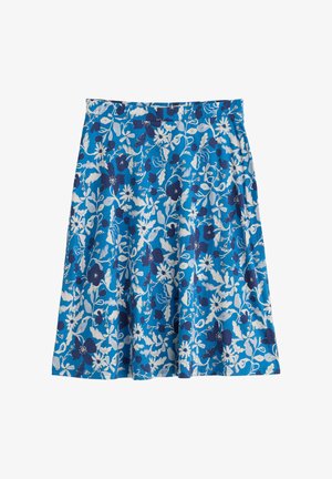 Jupe bleu mi-genou avec un motif floral blanc et marine et une ceinture ajustée.