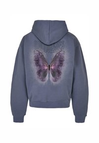 Hooded sweatshirt in gray fabric featuring a large purple butterfly graphic on the back, with bold black text above it. Soft texture, casual fit.