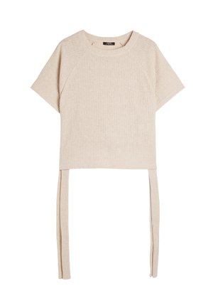 Beżowy sweter typu cropped z krótkimi rękawami raglanowymi, żebrowaną fakturą i dwoma długimi trokami na dole do regulacji lub stylizacji.