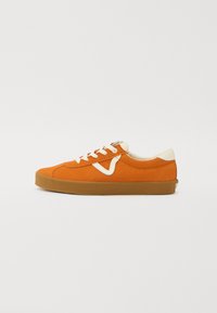 Orange suede sneaker with white accents, round toe, and beige laces. Features a textured rubber sole and smooth inner lining.