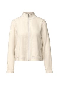 Světle béžová bunda na zip z texturovaného materiálu, s vysokým límcem, dvěma předními kapsami a elastickými manžetami pro těsné padnutí.