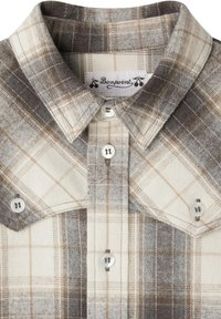 Camicia con colletto e bottoni, con un motivo a quadri marrone, beige e crema, dotata di tasche sul petto con chiusure a bottone.