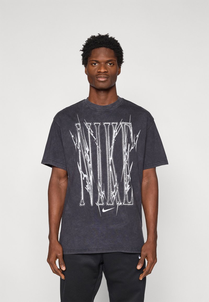 Nike Performance TEE TRAIN - Triko s potiskem - black
