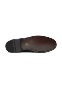 Brown leather shoe sole with smooth texture, rubber traction pattern, and printed logo. Features a curved shape and reinforced stitching.